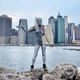 Illustration for article titled Womens bodies blend into a citys background with just bodypaint
